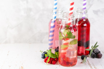 Selection of different drinking vinegars - cranberry, mint, blueberry, thyme, blackberry sage