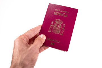 Caucasian man left hand offering spanish passport