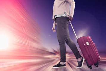 Girl with suitcase on wheels