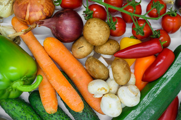 Background surface of various vegetables placed on white background