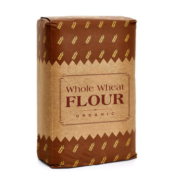 Whole flour in kraft or craft paper bag isolated on white background