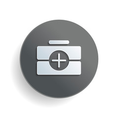 first-aid kit, simple icon. White paper symbol on gray round button or badge with shadow