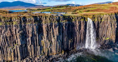 Aerial view of the dramatic coastline at the cliffs by Staffin with the famous Kilt Rock waterfall - Isle of Skye - Scotland - obrazy, fototapety, plakaty