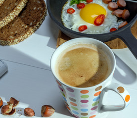 black coffee with brown foam
