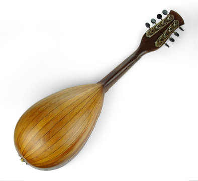 Old mandolin located diagonally on a white background. Back view. Isolated on white background.