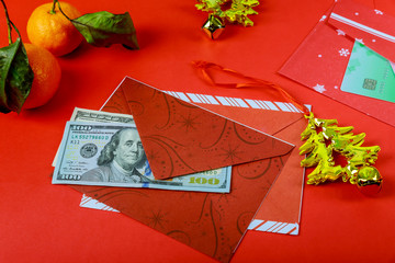 Chinese New Year Decorations red envelope and American Dollar happy new year or fortune or good luck wishes