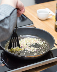 Fried onion on the pan