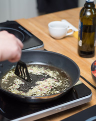 Fried onion on the pan