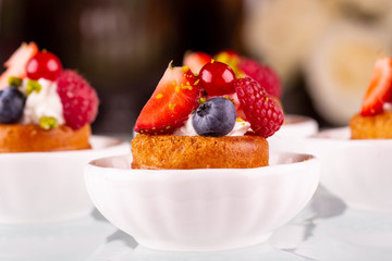 Berries with pistachio mousse and a fresh berry biscuit
