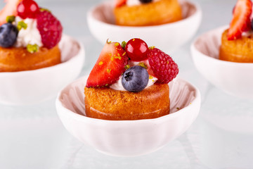 A fresh biscuit with berry cream, bilberry, raspberry and strawberry