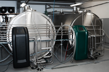Milk cooling tank with horizontal storage. Storing and cooling milk in dairy farming.