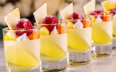 Jelly with mousse in shota with white chocolate and fresh berries