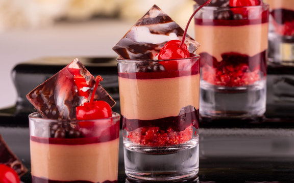 Cherry, chocolate mousse dessert and cherry jelly