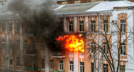 Odessa, Ukraine - Dec. 29, 2016:  fire in an apartment building. Strong bright light and clubs,...