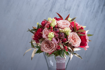 Red flowers in wedding buequet. botanical style concept. Close up
