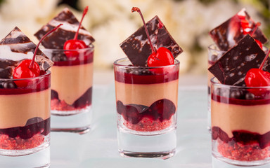 Cherry jelly with cherry cream, milk chocolate and chocolate balls