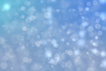 Shiny blue bokeh blur background. Glowing glitter circle particles holiday.