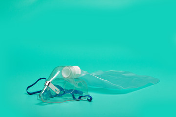 Rebreathing mask, bright green background