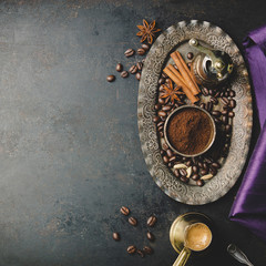 Fototapeta na wymiar Coffee composition with vintage manual coffee grinder