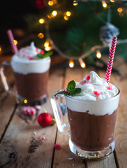 Close-up of Christmas mint hot chocolate on wooden background