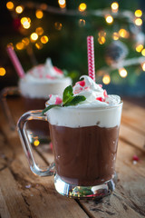 Close-up of Christmas mint hot chocolate on wooden background
