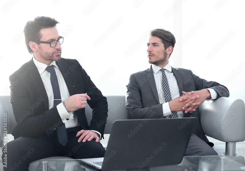 Wall mural business partners at a business meeting in the lobby of the business center