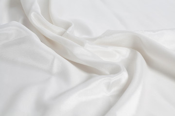 Obraz premium Closeup of rippled white silk fabric background