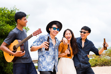 Friends having party outdoors