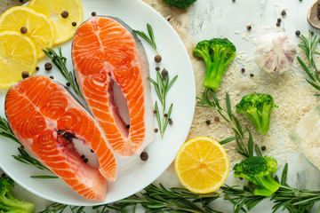 Fresh fish, salmon steaks with vegetables. Flat-lay. Top view, tasty and healthy food