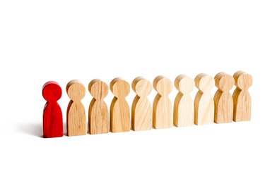 A red man stands with people in a row on a white background. The concept of exceptional and...