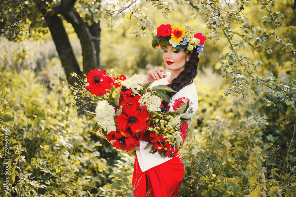 Wall mural portrait of young woman in traditional ukrainian style