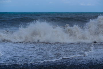 Stormy sea waves breaking near the coast