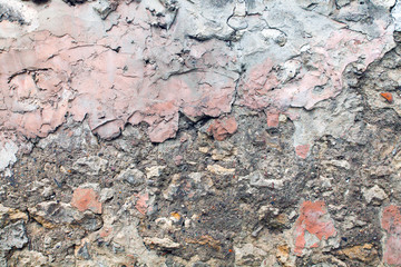 Dark faded concrete texture, molded old wall, faded and cracked paint.