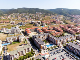 Fototapeta na wymiar aerial shooting of the resort in Sveti Vlas, sea view and hotel residential buildings with swimming pools