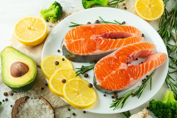 Delicious fresh fish steaks, salmon, trout. With vegetables, deli, vegan food, diet and Dotex