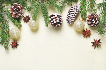 Christmas composition on wooden background.