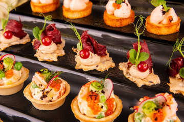 Red currant, venison, small loaf, mousse, shrimp, vegetables, greens, red caviar