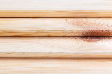 Natural wooden brown background, rough texture of hardwood planks for floors and walls in the construction of the house