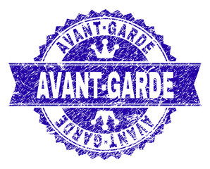 AVANT-GARDE rosette stamp watermark with distress style. Designed with round rosette, ribbon and small crowns. Blue vector rubber watermark of AVANT-GARDE text with unclean texture.