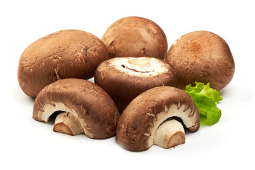 Fresh Brown Champignon Mushrooms with lettuce, close-up, isolated on white background