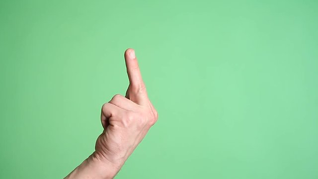 hand gesture meaning in western cultures Fuck you or fuck off isolated green screen