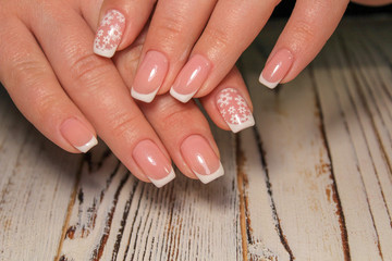 Hands with beautiful manicure. Natural nails with gel polish