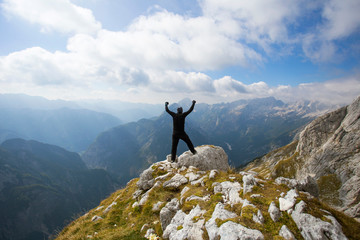 Hiker on path to Prisojnik peak, Julian Alps - Slovenia. 