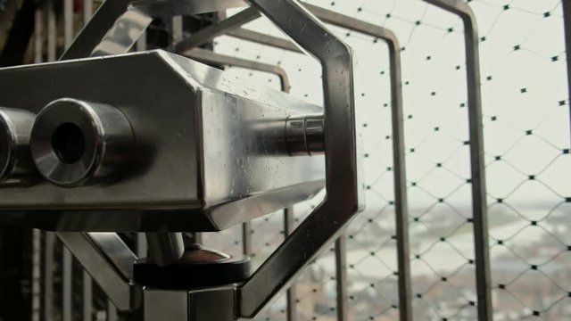 Matal coin operated binocular telescope on top of sightseeing point