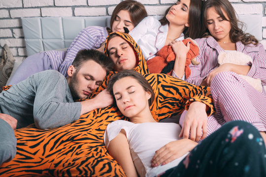 Sleeping group of young people.