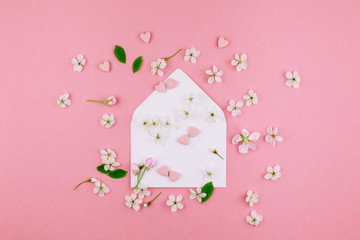 Concept of love letter with envelope and flowers