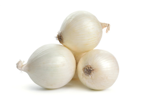 White onion bulbs isolated on white background