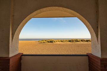 Looking through the arch towards the sea on a bright day