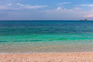 Moody seascape. Beautiful seascape with the emerald waters of the sea of Elba Island. Tuscany, Italy