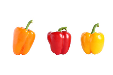 Orange, red and yellow sweet paprika isolated on white
